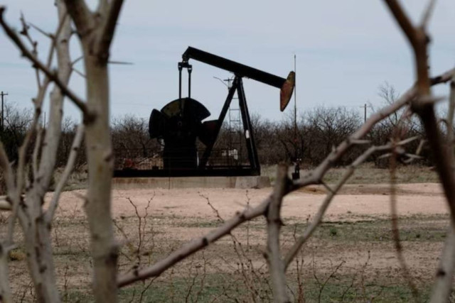 A pump jack drills oil crude from the Yates Oilfield in West Texas’s Permian Basin, near Iraan, Texas, US, March 17, 2023.